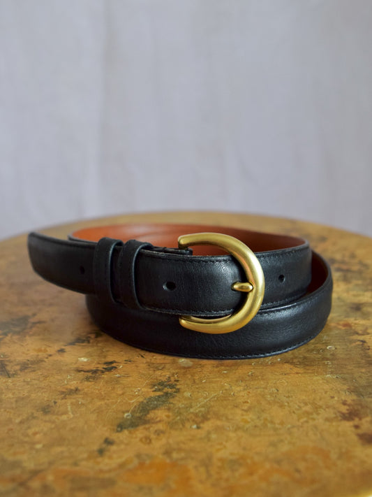 vintage 1990s black leather and brass belt by Coach, style number 8400