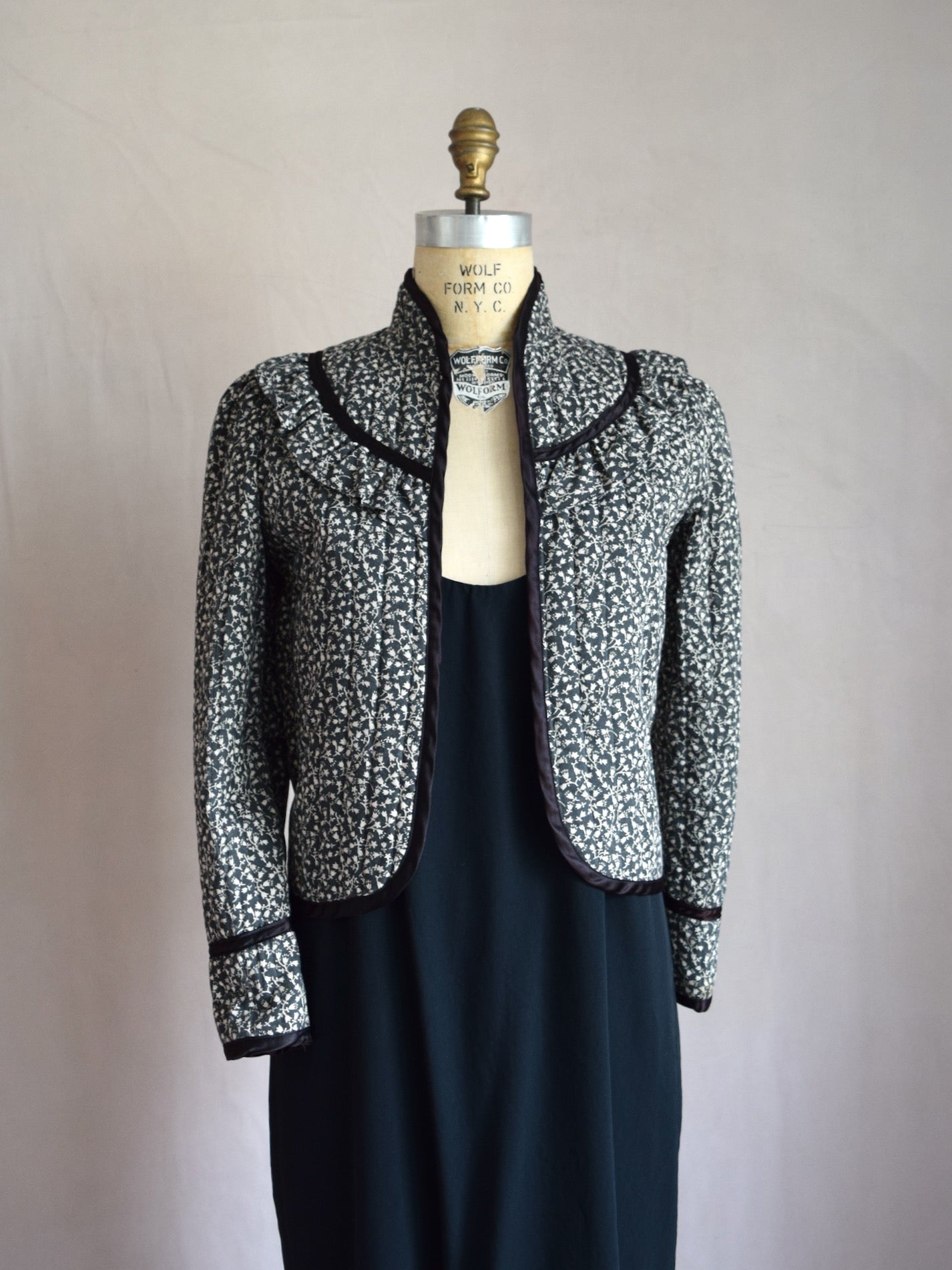Vintage 1970s black and white calico print quilted jacket